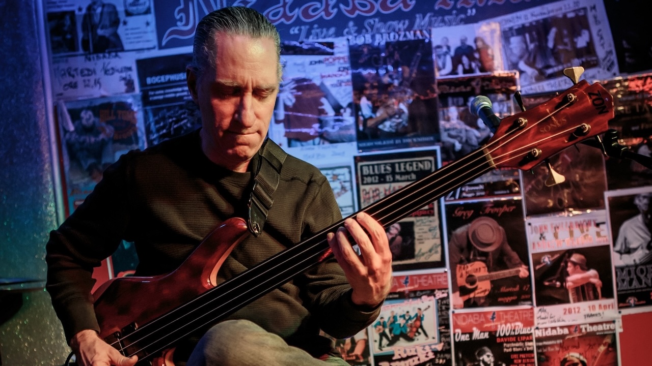 “I’ve been trying to complete an over-the-top, everything-but-the-kitchen-sink, double-neck, 6-string bass, but it hasn’t been easy!” How Michael Manring’s search for new sounds led to the creation of his signature Zon Hyperbass