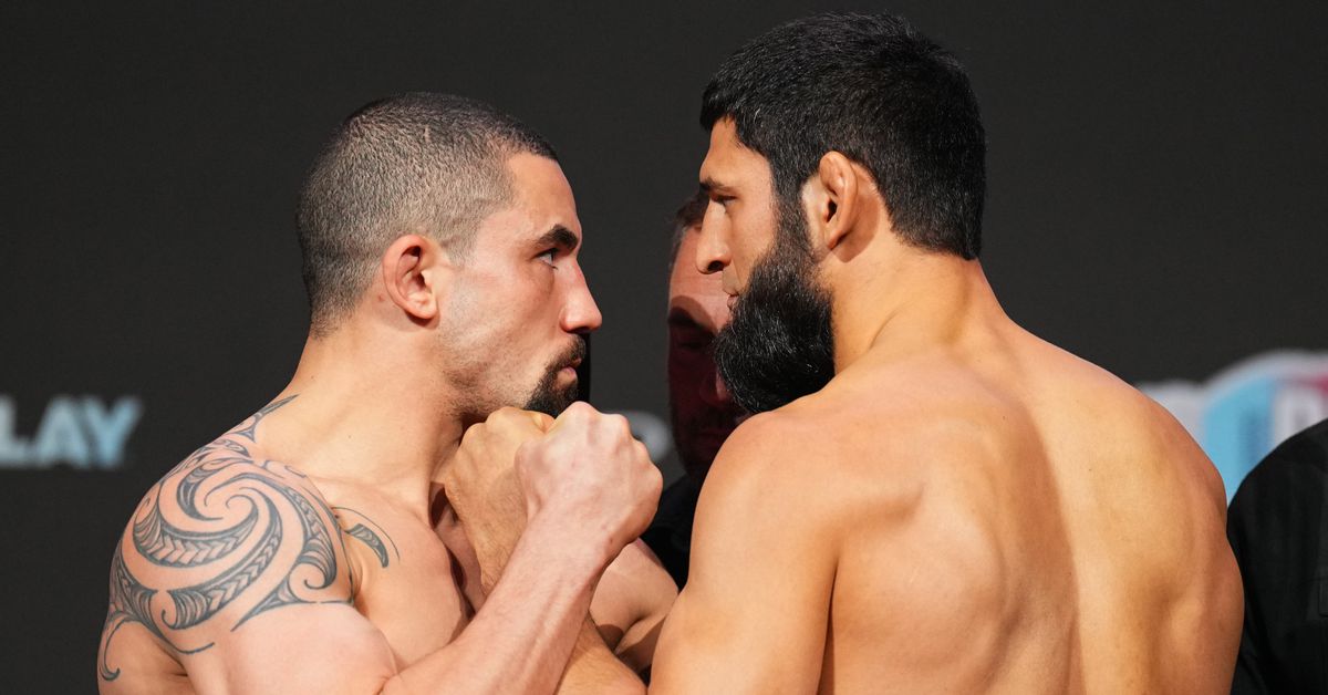 Video: Robert Whittaker, Khamzat Chimaev exchange icy stares in faceoff ahead of UFC 308